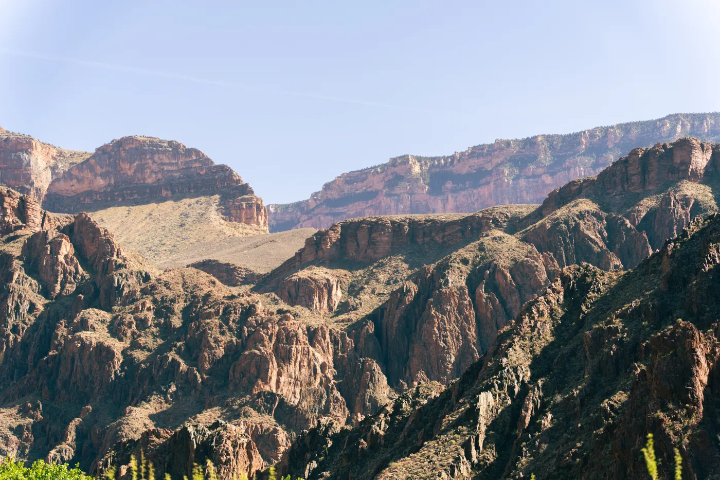Grand Canyon cliffs under a clear blue sky