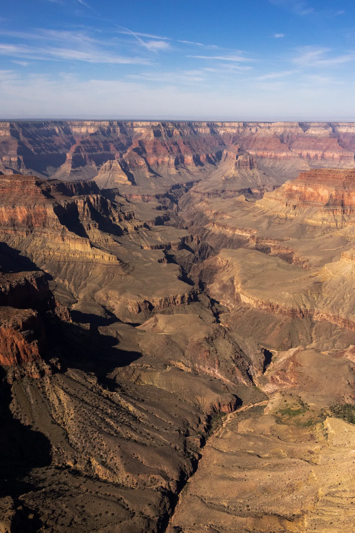 Layered canyon walls of the Grand Canyon seen from the air